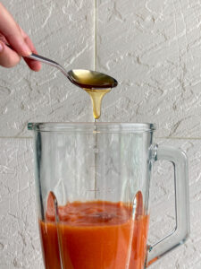 Add honey to blender
